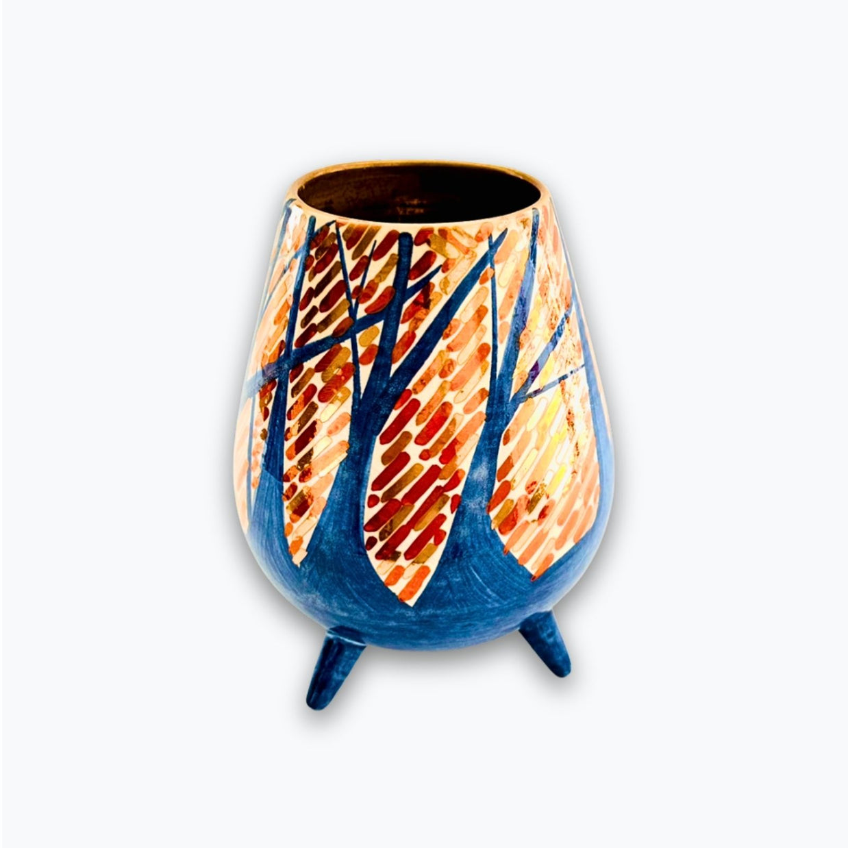 Vasija trípode bosque otoñal en reflejo metálico