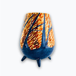 Vasija trípode bosque otoñal en reflejo metálico