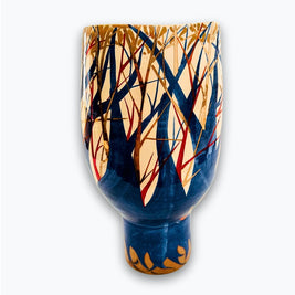 Jarrón ecos del bosque al atardecer en reflejo metálico